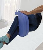 Coussin de positionnement et déplacement latéral au lit